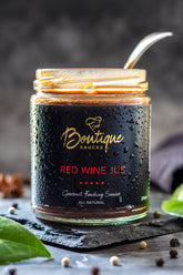 Rich, velvety jus red wine from Boutique Sauces. A gourmet sauce perfect for steak, prime rib, lamb, roast beef, and roasted chicken